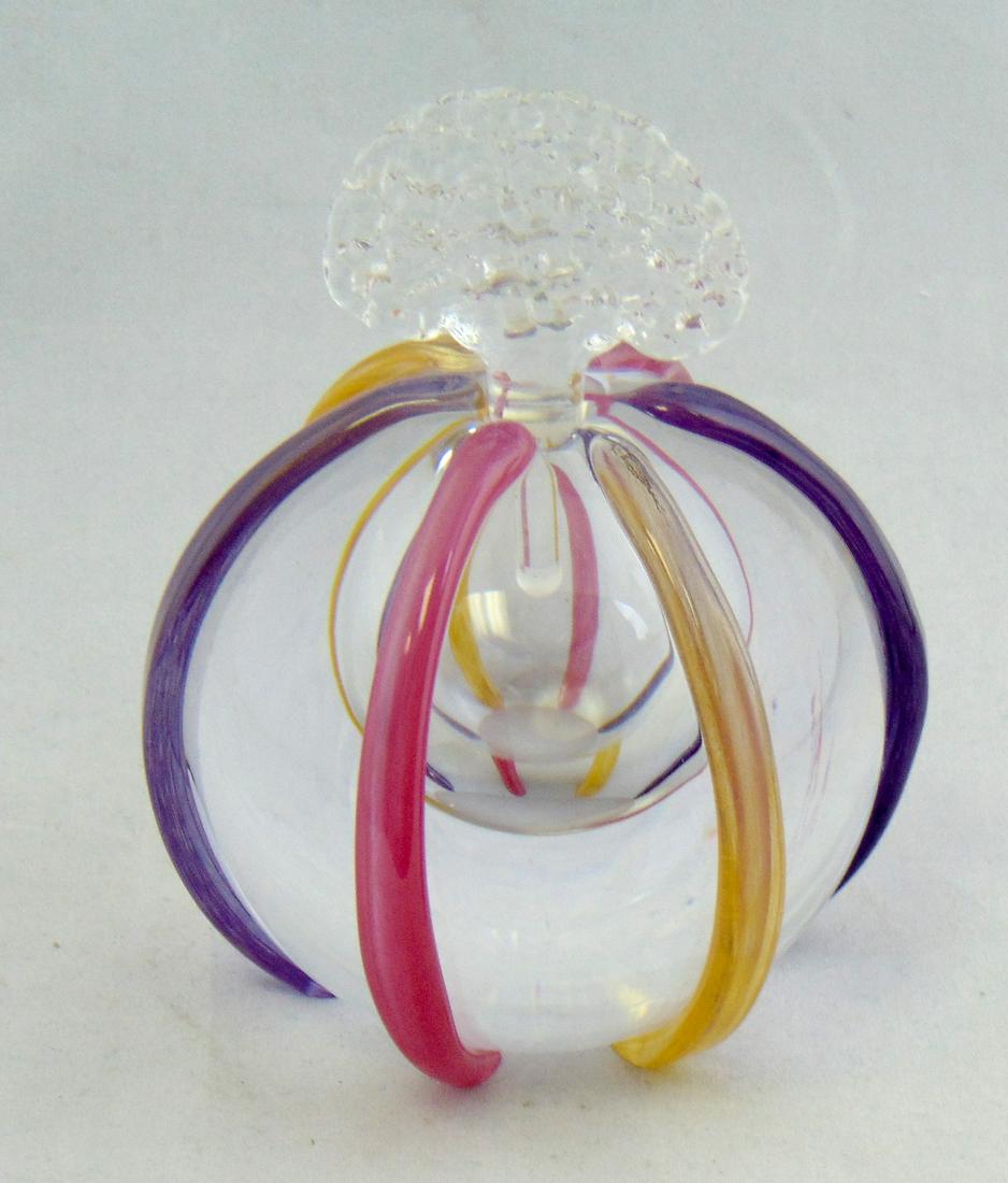 Leon Applebaum art glass perfume: Ovoid form in clear glass with raised appliquŽ of yellow, purple, pink bands, signed Leon Applebaum, 5" ht. Condition: good with no defects found.