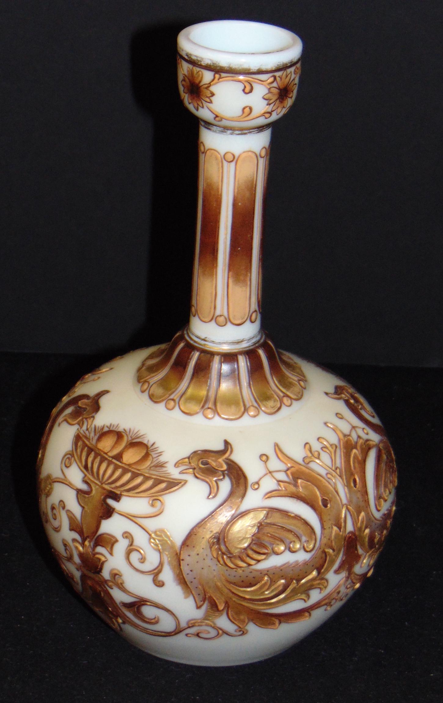 Thomas Webb and Sons glass vase: Bulbous opaline glass vase enameled with Griffins and urns, marked on the bottom Tiffany and Co. Paris Exhibition Thomas Webb and Sons, 8" ht. Condition: good with no defects found.