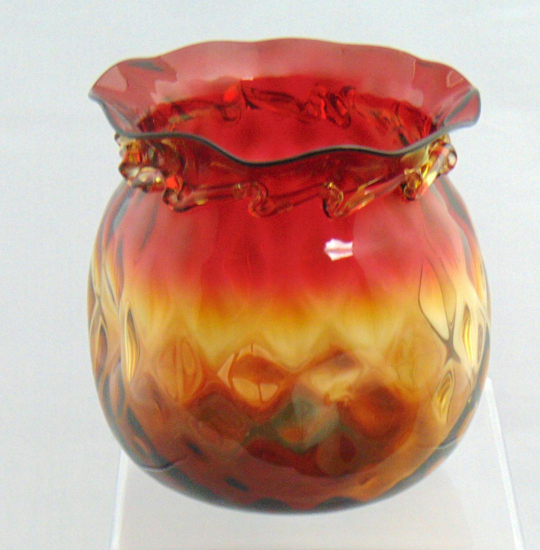 Large Amberina Rigaree vase: Ovoid form in with a scalloped rim in the optic diamond pattern adorn with a rigaree collar, 5" ht. Condition: good with no defects found