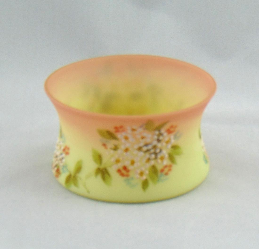 Mt Washington Burmese sugar bowl: Mt. Washington flaring Burmese sugar bowl decorated with clusters of daisies, 3 1/2" wide. PROVENANCE: Earlys Auction Rindge collection to the Black collection. Condition: good with no defects found.