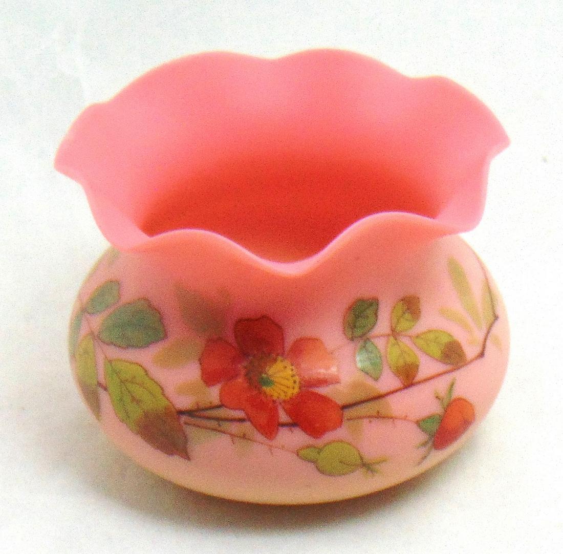 Webb Burmese scalloped rim bowl: Ovoid form with a scalloped rim decorated with red Primrose and green leafy stems, 4" wide. Condition: good with no defects found