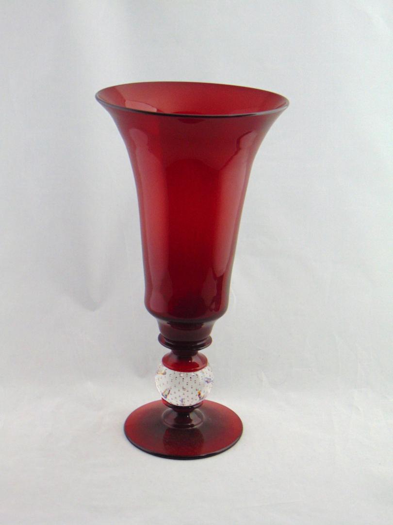 Pairpoint Ruby footed trumpet vase: Ruby foot and bell separated with a controlled bubble standard, 13" ht. Condition: good with no defects found