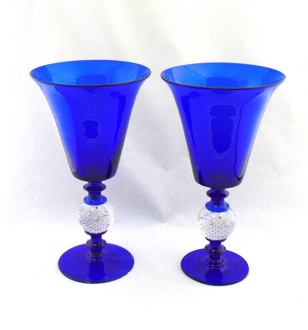 Pair of Pairpoint stemmed compotes: Tall cobalt goblet form compotes adorned with a control bubble balled standard, 11 3/4" ht. Condition: minor chips to feet
