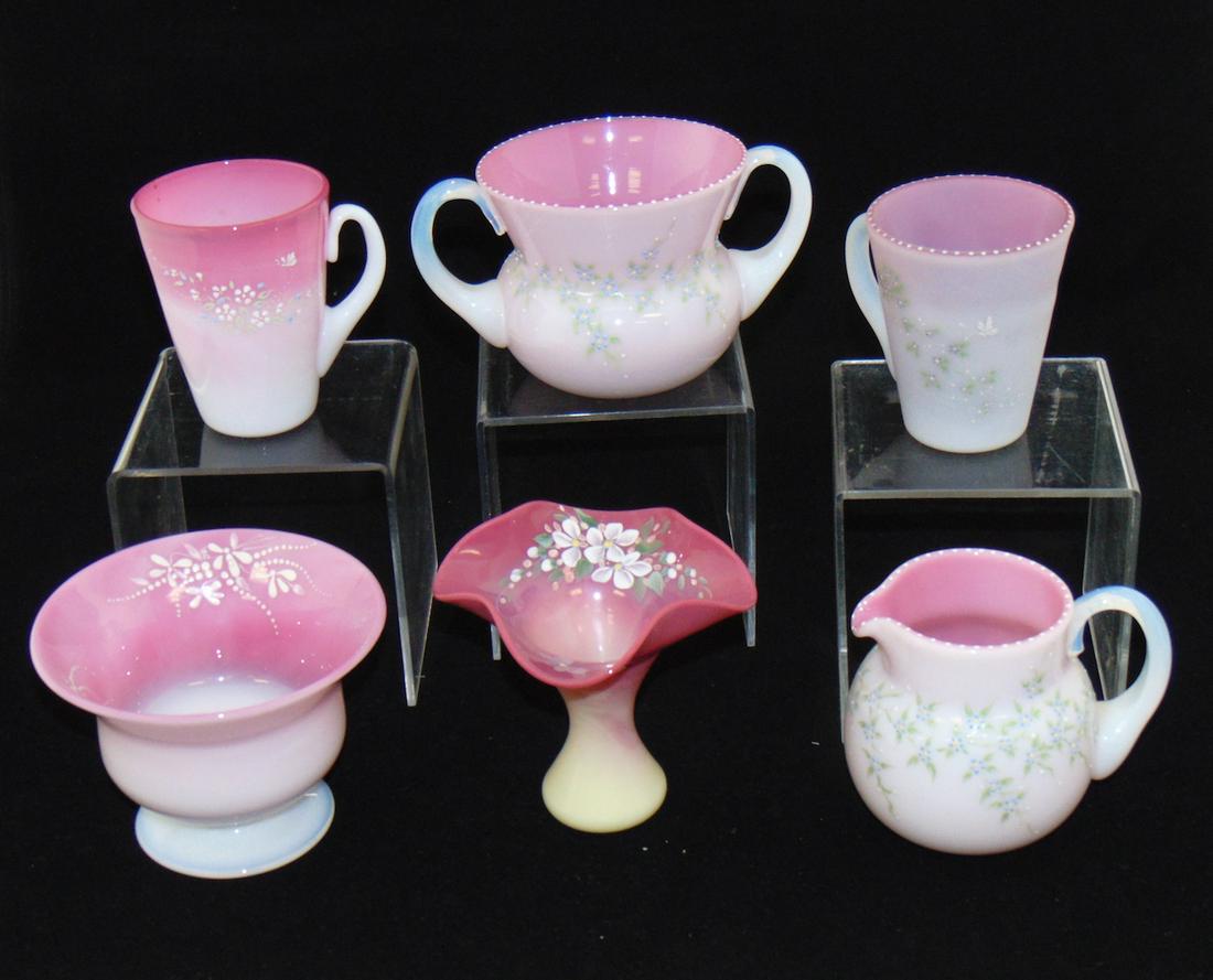 Six piece grouping of Pairpoint: Six mid Century Pairpoint Peachblow glass items including each with enameled flowers, tallest 4" ht. PROVENANCE: Rindge collection to the Black collection. Condition: good with no defects found