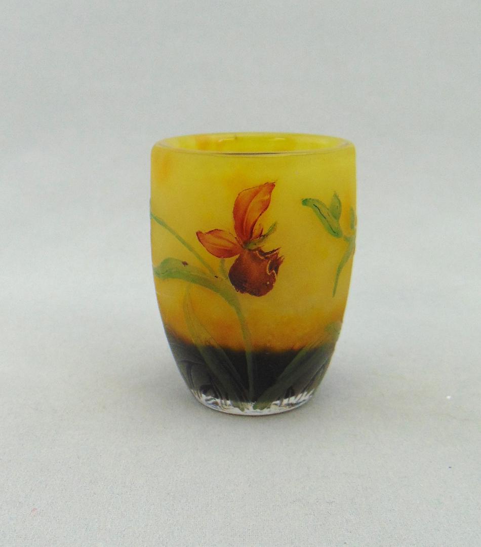 Daum French cameo glass vase: Diminutive barrel form in mottled yellow and purple glass decorated with two stemmed iris on green leafy branches, signed in cameo Daum Nancy, 2" ht. Condition: good with no defects found