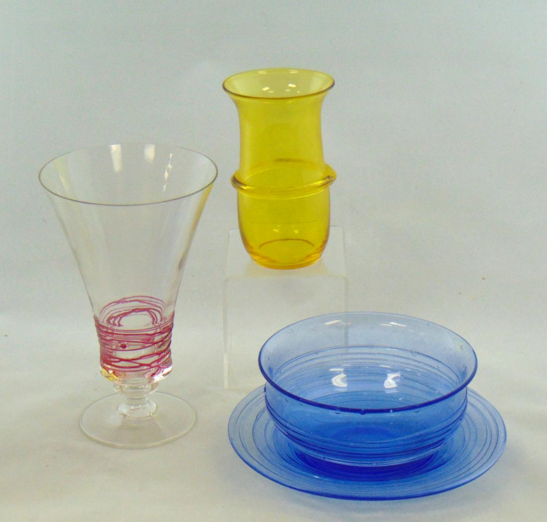 Three Steuben glass items: Including a French Blue finger bowl and underplate with threading and bubbles, a translucent goblet with gold ruby threading, together with a Bristol yellow cylindrical vase probably used as a bladder