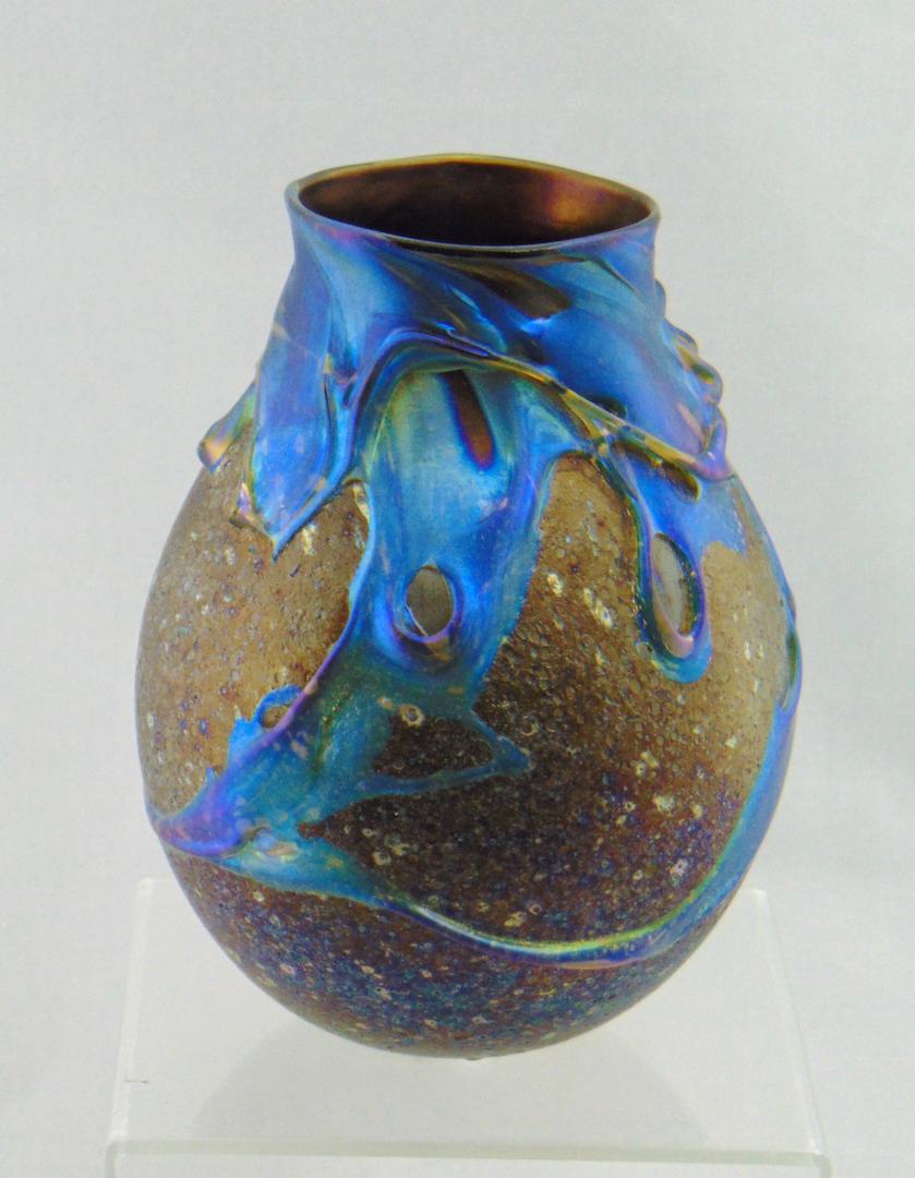 Charles Lotton Cypriot glass vase: Ovoid form in dark umber Cypriot decorated with a cascading iridescent blue Lava, signed Charles Lotton 1996, 6 1/4" ht. PROVENANCE: Bruce Orr collection to Earlys Auction to the Black collection. Con