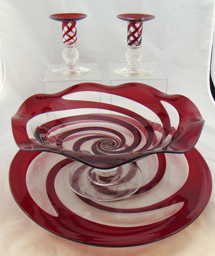 Pairpoint swirled glass console set,: Set includes a large platter with a footed compote and two side candlesticks, 14" wide. Condition: good with no defects found.