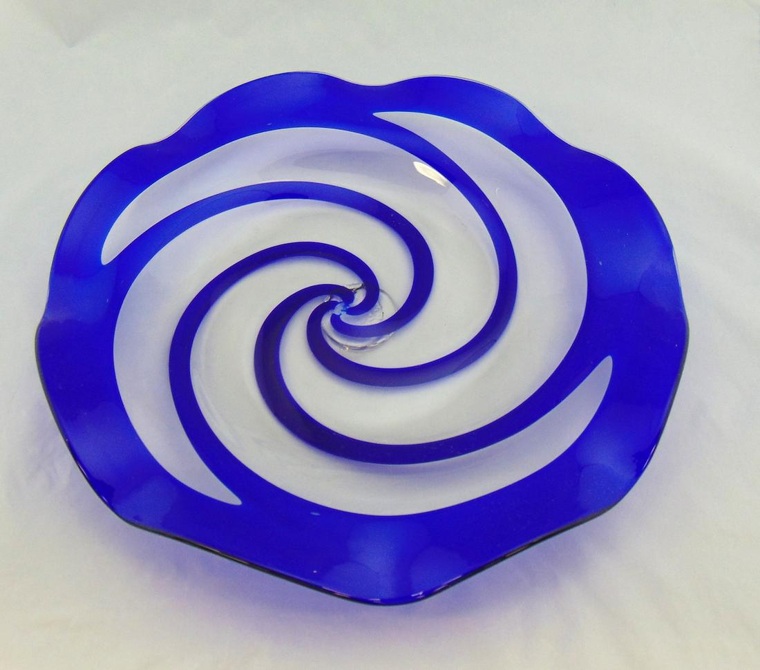Pairpoint Swirled Platter Blue: Large Pairpoint blue swirled pattern platter with a scalloped rim, 13 1/2" wide, Condition: foot glass gather has spread into the bowl see picture 4.