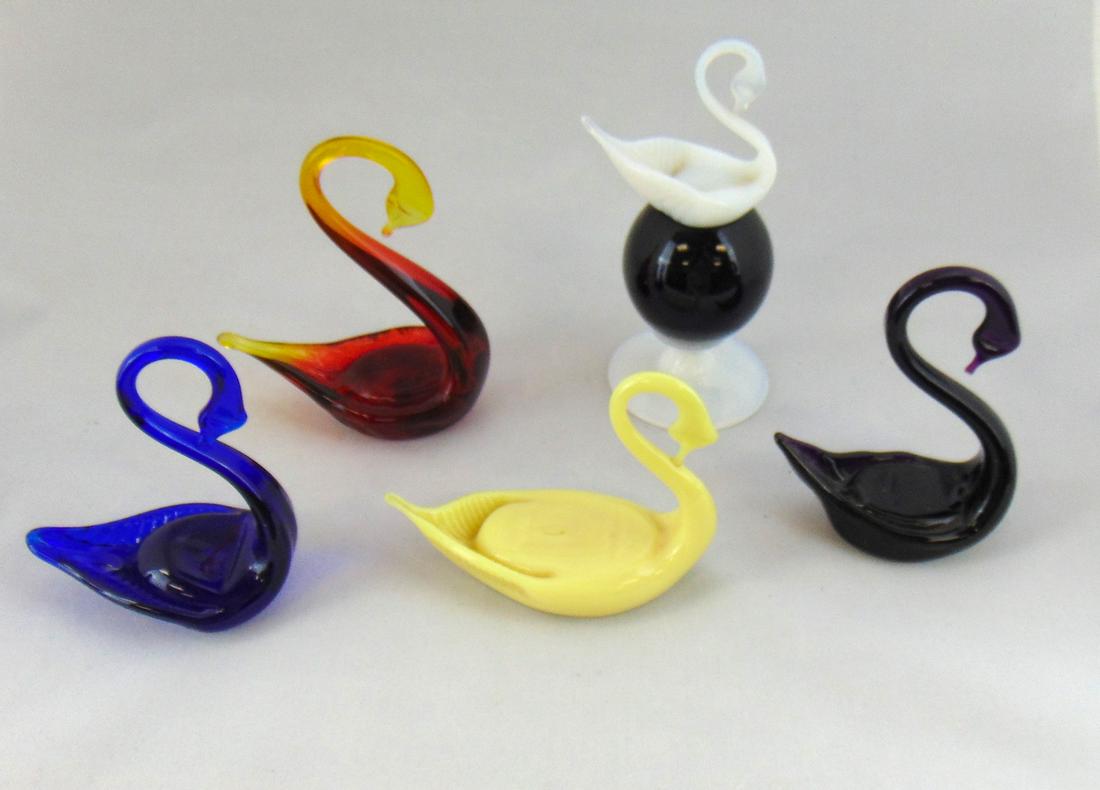 Five Pairpoint whimsical swans,: Five Pairpoint swimming glass swans one with a ball standard, 6 1/2" ht. Condition: good with no defects found.
