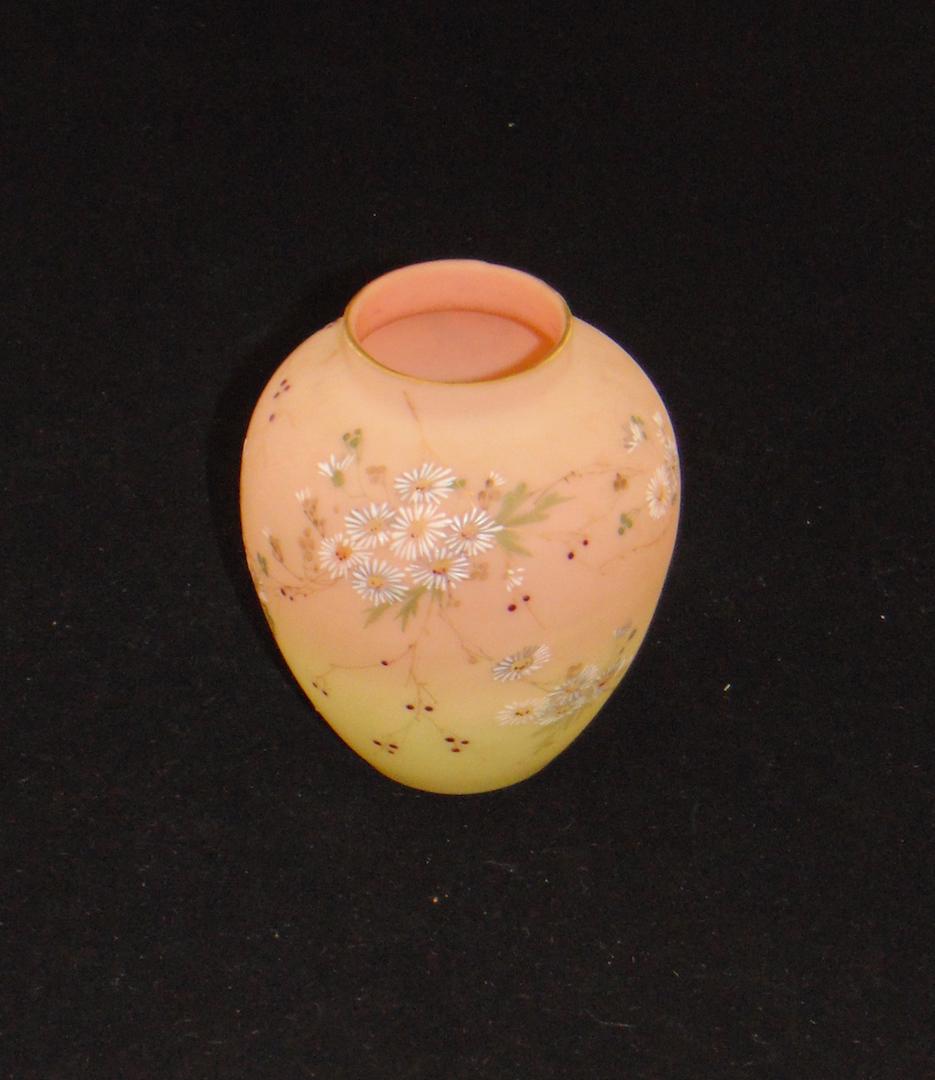 Mt Washington Burmese glass Vase: Ovoid form decorated with branches of blue and white daisies, 4 1/2" ht. Condition: good with no defects found.