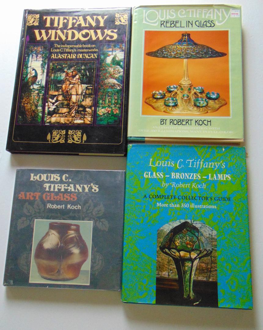 4 Books on Tiffany glass and lamps: Including "Tiffany Windows" by Alastair Duncan, and 3 books by Robert Koch, each hardback. Condition: minor wear.