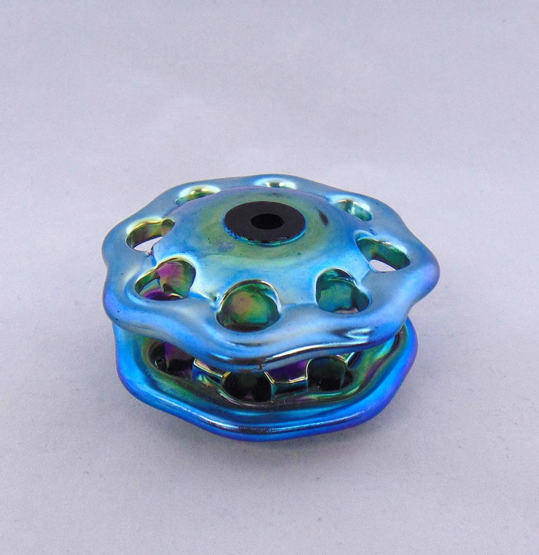 Steuben Blue Aurene flower frog,: Double tier flower frog in Blue Aurene glass with eight slots, 4" wide. NOTE: attributed to Steuben Condition: good with no defects found.