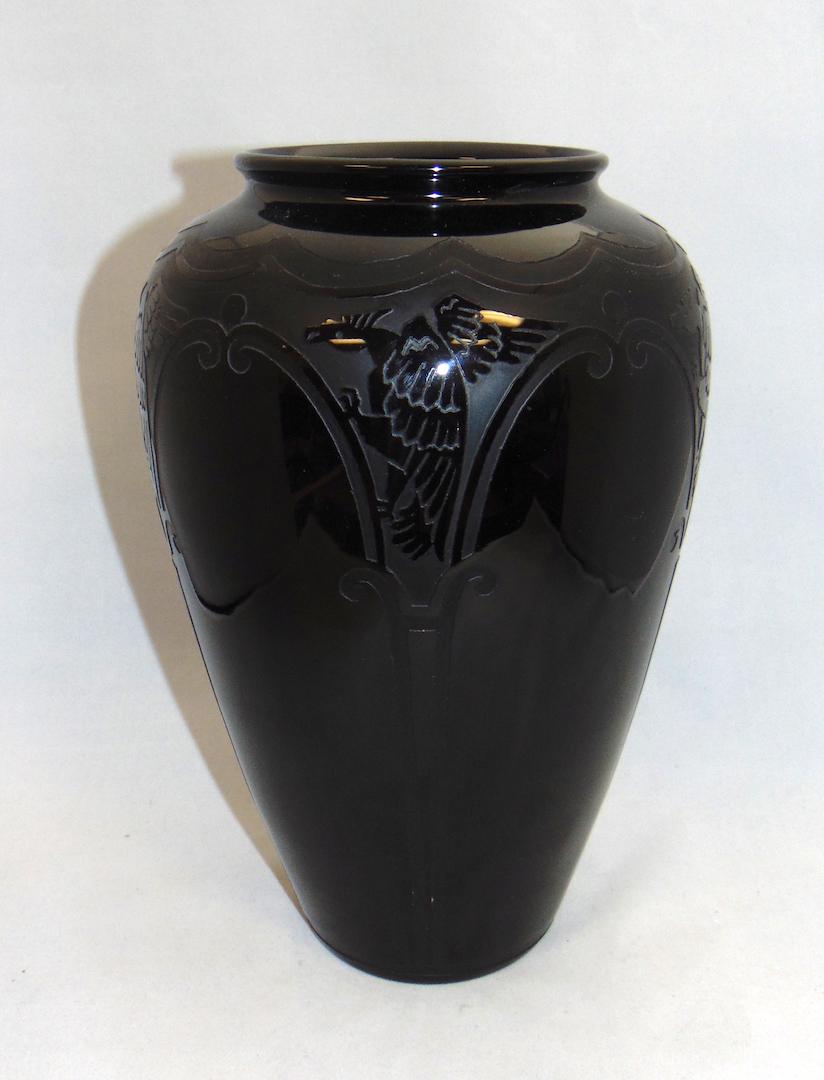 Steuben mirror black ACB glass vase: Ovoid shouldered form in mirror black glass decorated with Art Deco Griffins in the Medieval pattern, 13" ht. Condition: good with no defects found