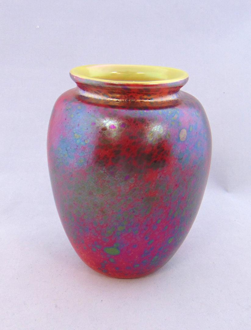 Orient and Flume Cypriot glass vase: Ovoid form in red and blue glass with a Cypriot finish, signed Roberta Eickinberg Orient and Flume 1992, 6" ht. Condition: good with no defects found.