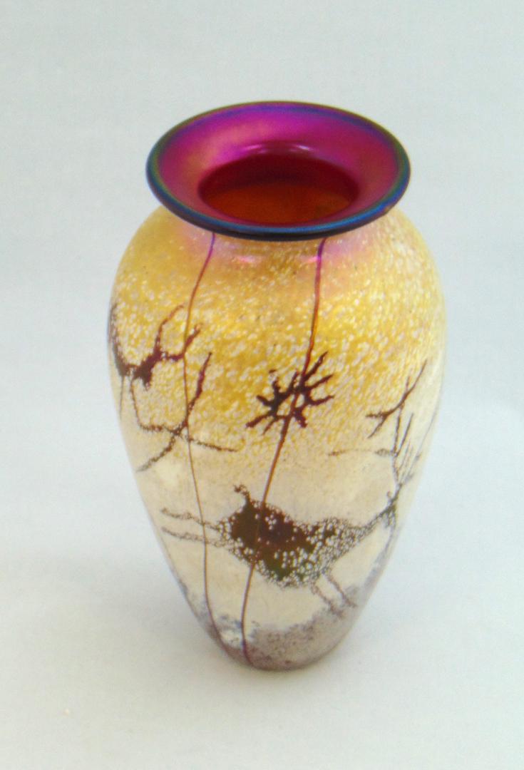 Satava Petroglyph glass vase,: Ovoid form in mottled purple and white decorated with Crimson cave drawings, signed R. Satava 6 3/4" ht. Condition: good with no defects found.