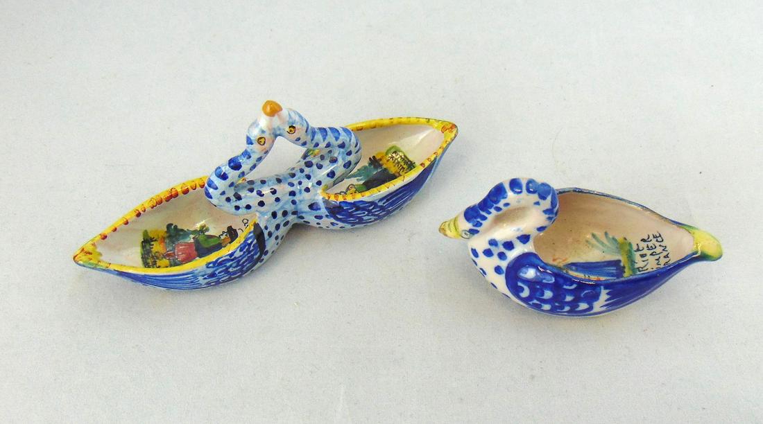 Two French Faience salt dishes: Including a marked Quimper open salts in the form of a swan and a Malicorne double with kissing swans, longest 5 1/2' long. Condition: good with no defects found.