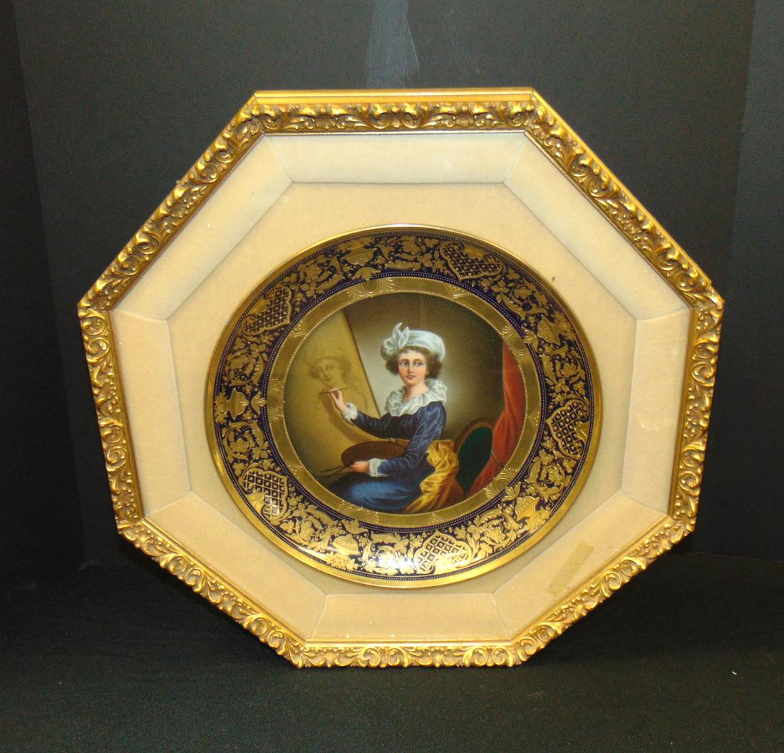 Royal Vienna framed porcelain plate: 11" wide Royal Vienna porcelain plate of a artist, fitted in an octagon shadow box, marked with the blue beehive, 17" wide. NOTE: thanks to a liveauctioneer bidder who informed us that this plate is o