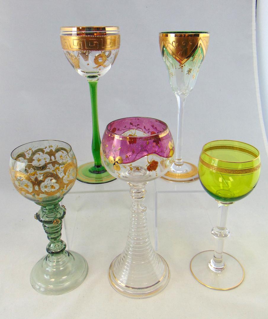 Group of five enameled goblets: Various colors and markers, tallest 8' ht. Condition: foot rim chips on the Roemer and the ruby flashed.