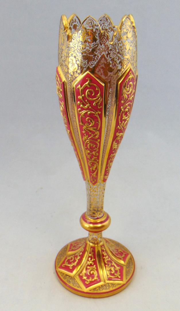 Graf Harrach art glass vase: Harrach Listovane glass vase with pink panels and overall heavy gold scrolling, 9" ht. LITERATURE: for similar example see "Moser Artistic Glass" book II page 153. Condition: good with no defects foun