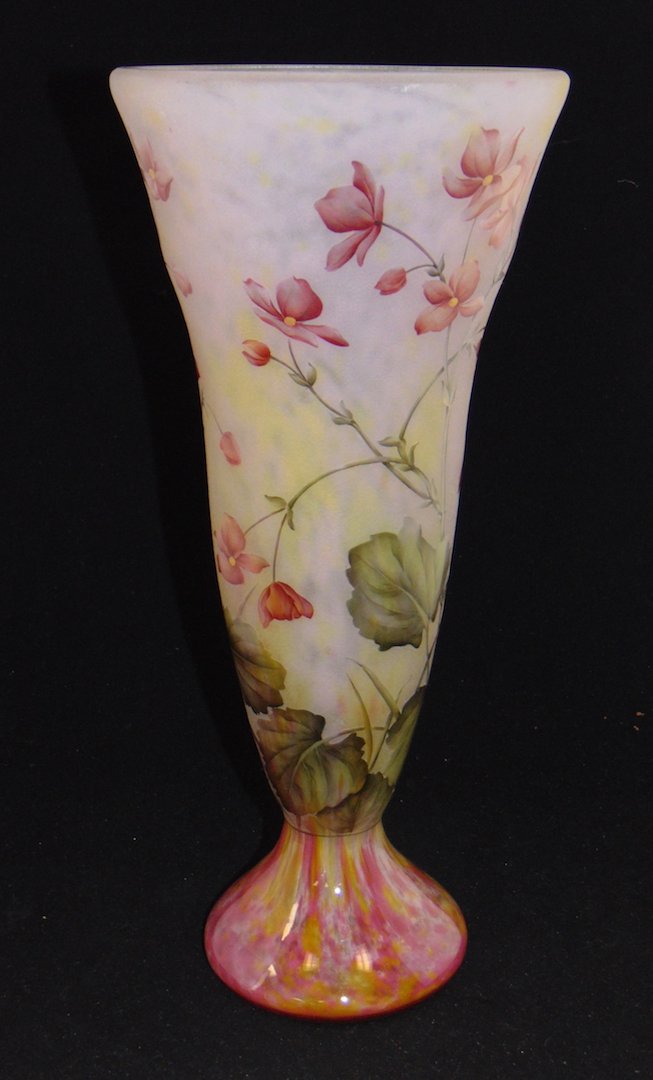 Daum Nancy French cameo vase: Footed trumpet form with an cranberry mottled foot extending to frosted vase decorated with a garden of red flowers on green leafy stems, signed Daum Nancy 16" ht. Condition: good with no defects foun