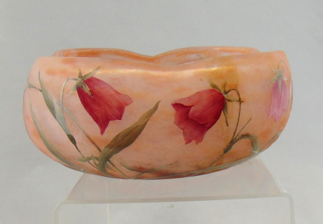 Daum Nancy French Cameo bowl: Large bowl with crimped hexagon rim in Peach mottled glass decorated with 12 red flowers in random green stems, signed in cameo Daum Nancy, 8 1/2" wide. Condition: good with no defects found.