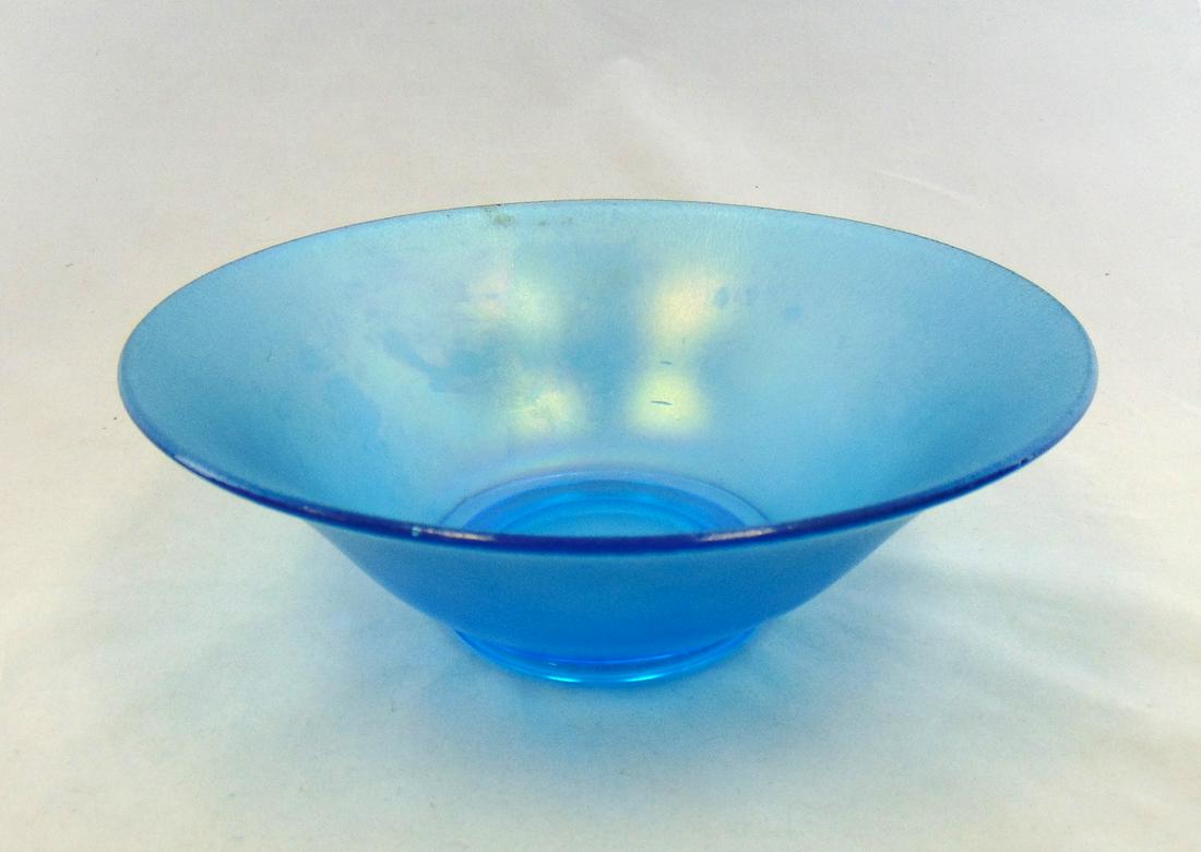 Blue iridescent glass bowl: Blue stretch glass bowl, 9 3/4" wide. Condition: good with no defects found.