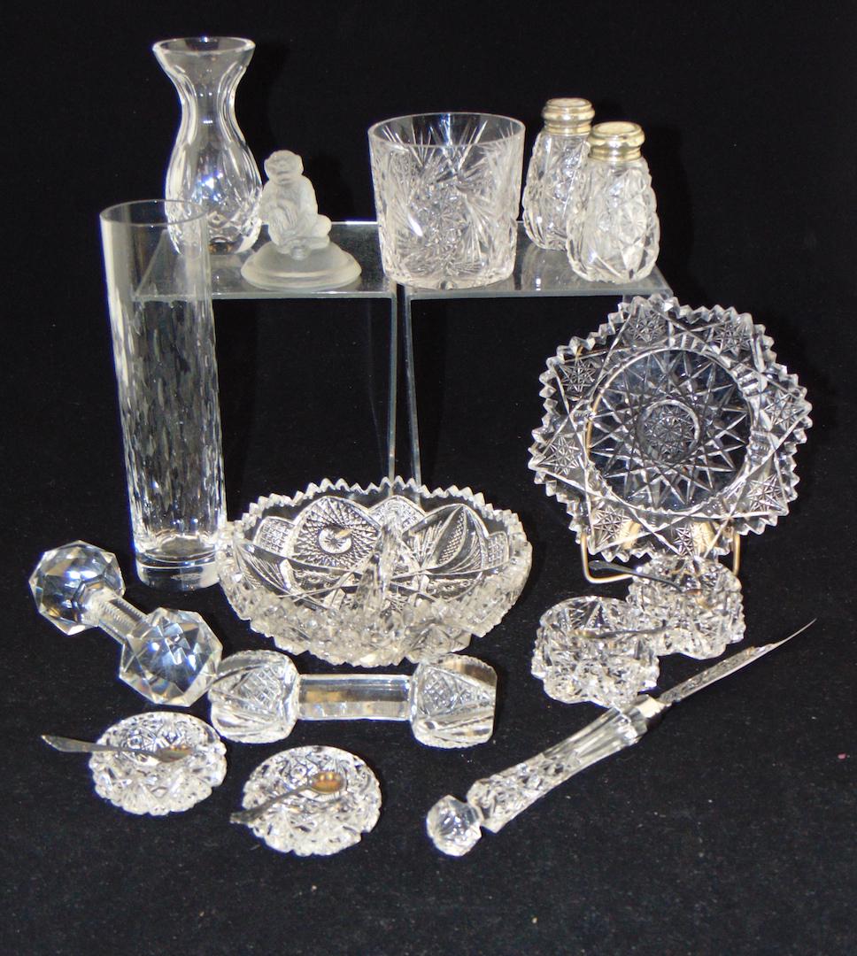 Group of Vintage glass items: Including two cut knife rests, four open salts, cut letter opener, cut salt and pepper shakers, a monkey paperweight, a signed Baccarat bud vase and more, tallest bud vase 7" ht. Condition: good with 