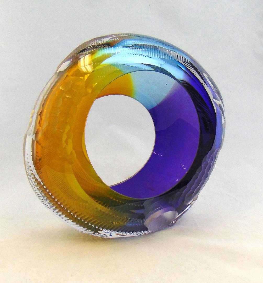 Leon Applebaum art glass wheel: Large open wheel in translucent colors of purple, blue, and yellow with wave and Battuto dÃ©cor, signed Leon Applebaum, 10 1/2' ht. Condition: good with no defects found