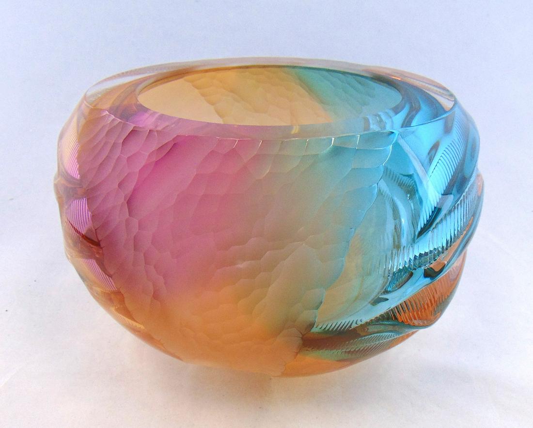 Leon Applebaum art glass bowl: Large Leon Applebaum glass bowl in rainbow color of crimson yellow, turquoise, and orange with waves and a Battuto band, signed Leon Applebaum 9 1/2" wide by 6 1/2" ht. Condition: good with no defects