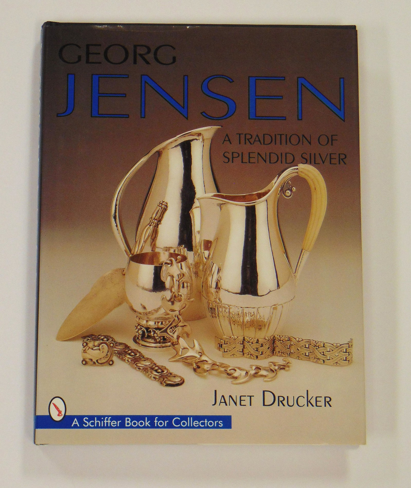 Book "George Jensen" by Drucker: Book "George Jensen" hardback 318 pages. Condition: good with no defects found.