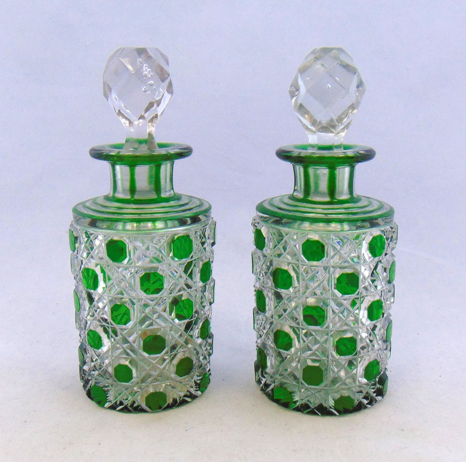 Pair of green cut to clear colognes (1 of 4)