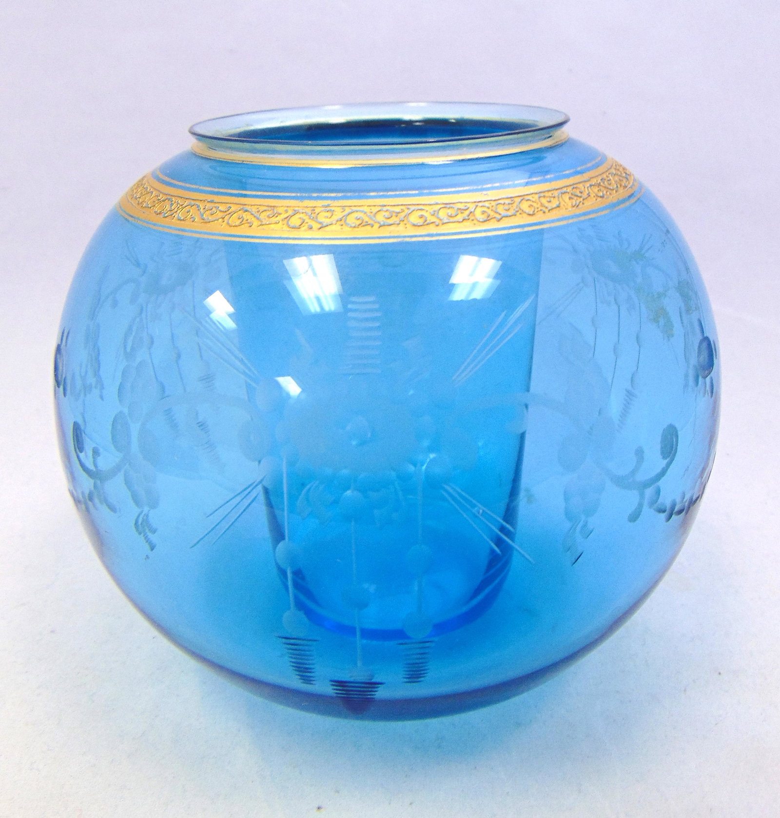 Rare Hawkes bowl and tumbler: Hawkes etched tumble-up rose bowl and tumbler in Prussian Blue with etched swags and gilt highlights, signed Hawkes, 5 1/2" ht. Condition: good with no defects found.