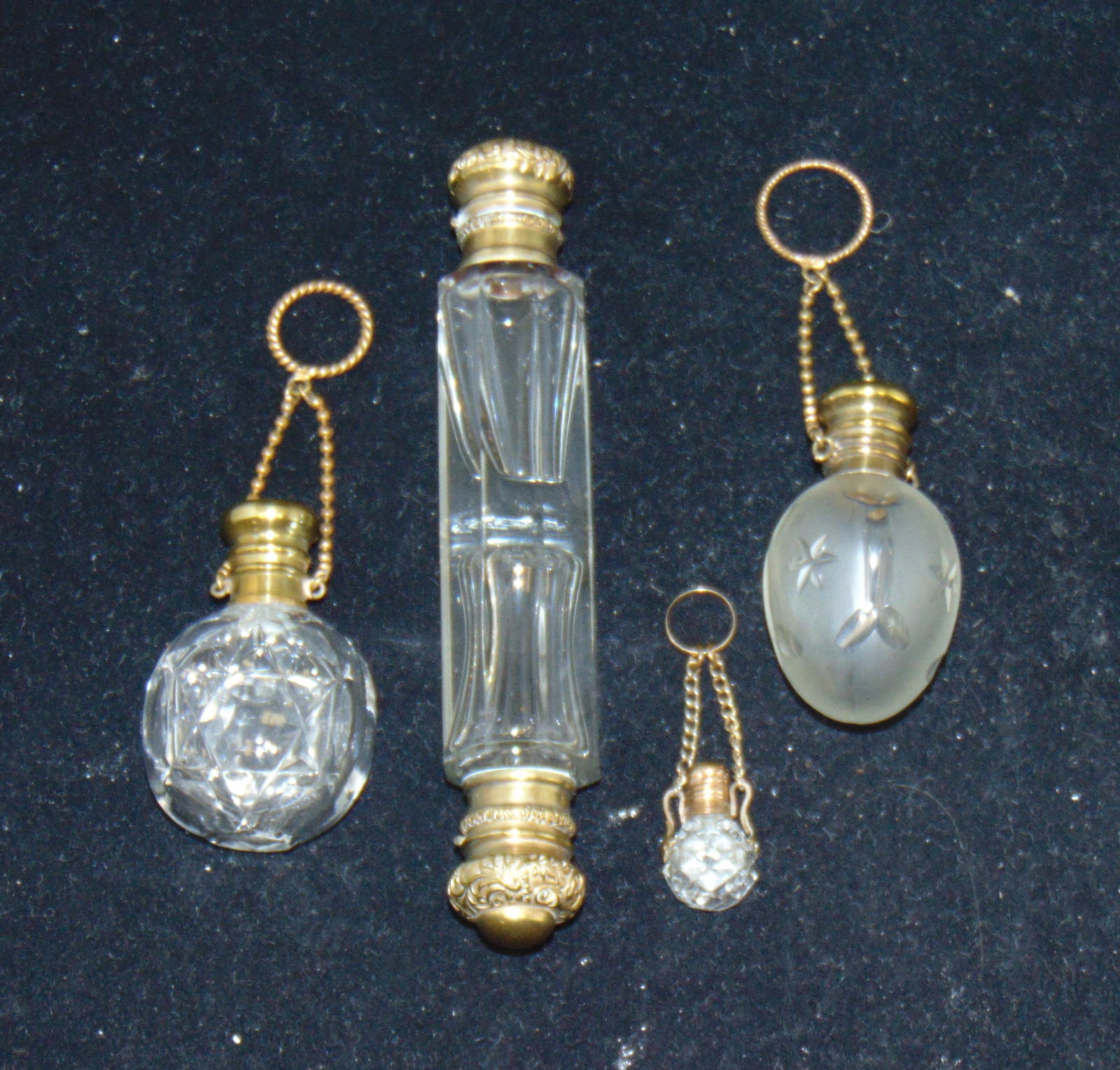 Four cut glass perfume bottles (1 of 3)