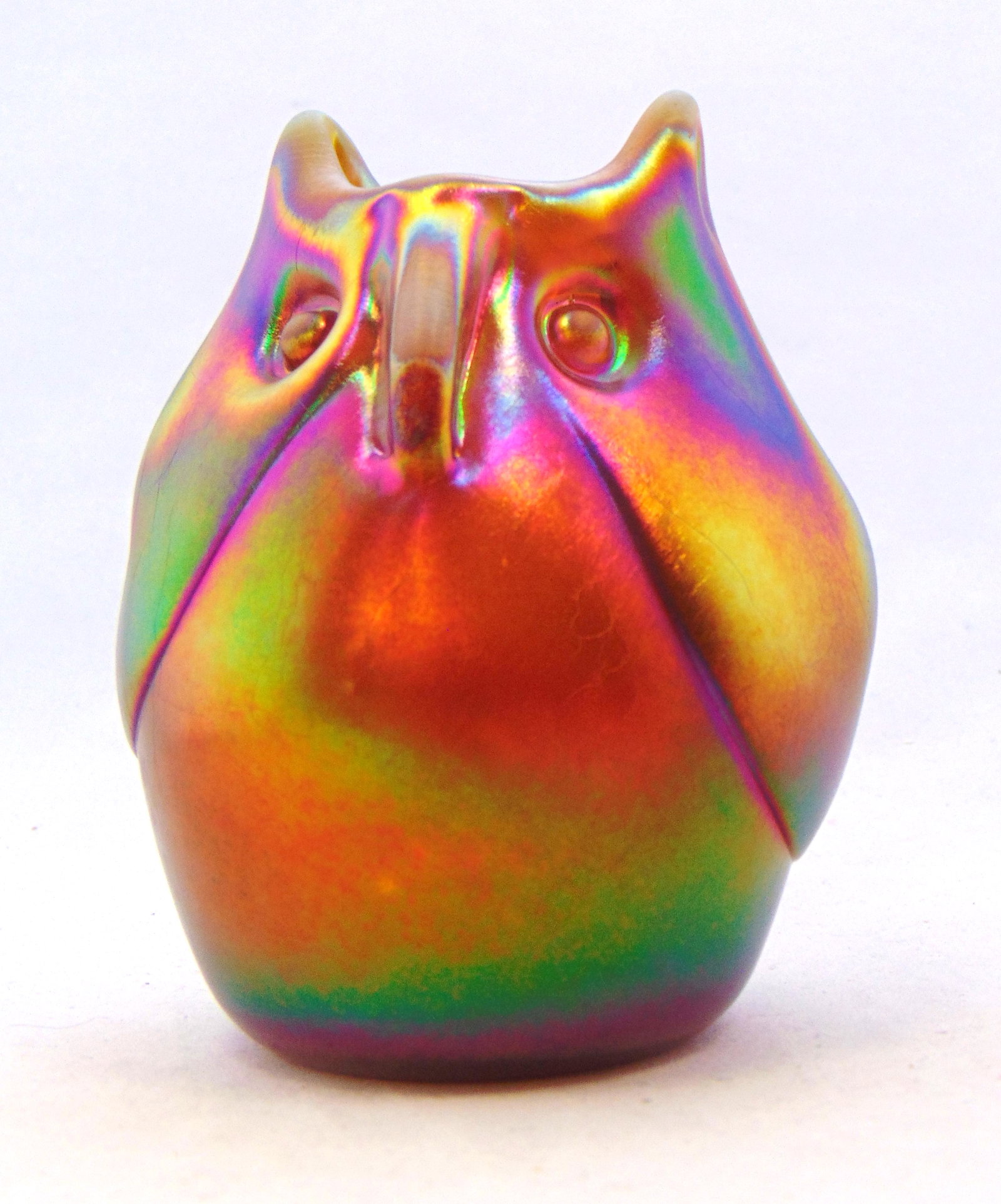 Dominick Labino glass owl: Dominick Labino iridescent copper glass owl, signed Labino 1970, 4" ht. Condition: good with no defects found.
