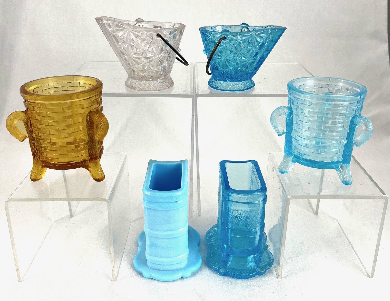 Group of six Adams toothpicks: Six figural Adams toothpicks including two oval baskets two books and two coal bucket, tallest 3 1/4" ht. Literature: Bredehofts/the Sanfords - Glass Toothpick Holders, Second Edition, p. 46. CONDITIO