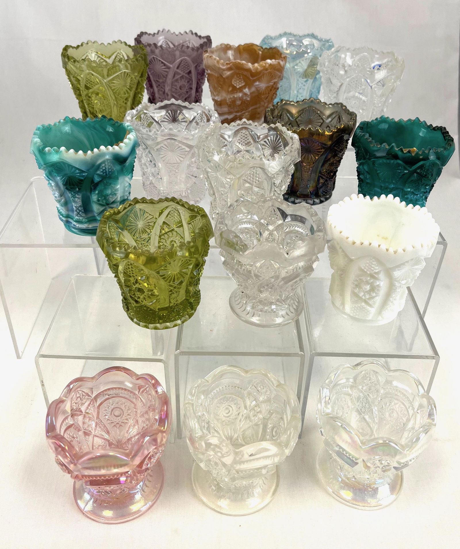 Group of Imperial glass toothpicks: Including four Fashion one that old, and 12 Octagon, tallest 2 1/2" ht. Literature: Bredehofts/the Sanfords - Glass Toothpick Holders, Second Edition, p. 105 and 106. CONDITION: good with minor wear