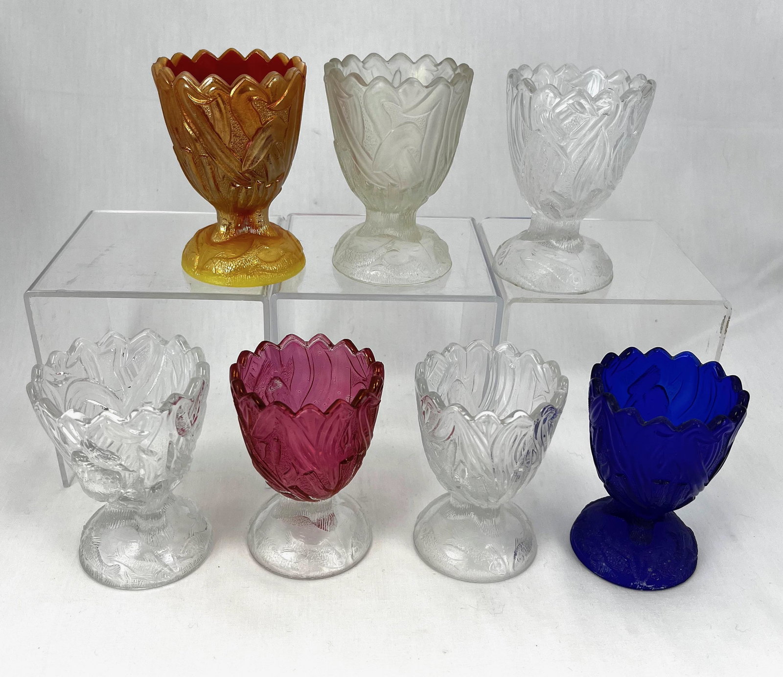 Seven Kingfisher glass egg cups: Seven Kingfisher glass egg cups various colors and makers, 3 1/2" ht. CONDITION: good with minor wear