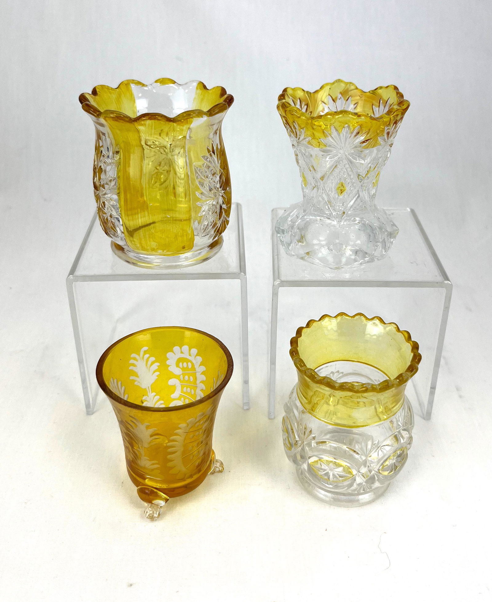 Four Amber Stained toothpicks: Four Amber Stained toothpick holders, including a Tacoma, a Shoshone, a Bohemian, and a Brilliant; tallest 2 5/8"; CONDITION: good with minor wear