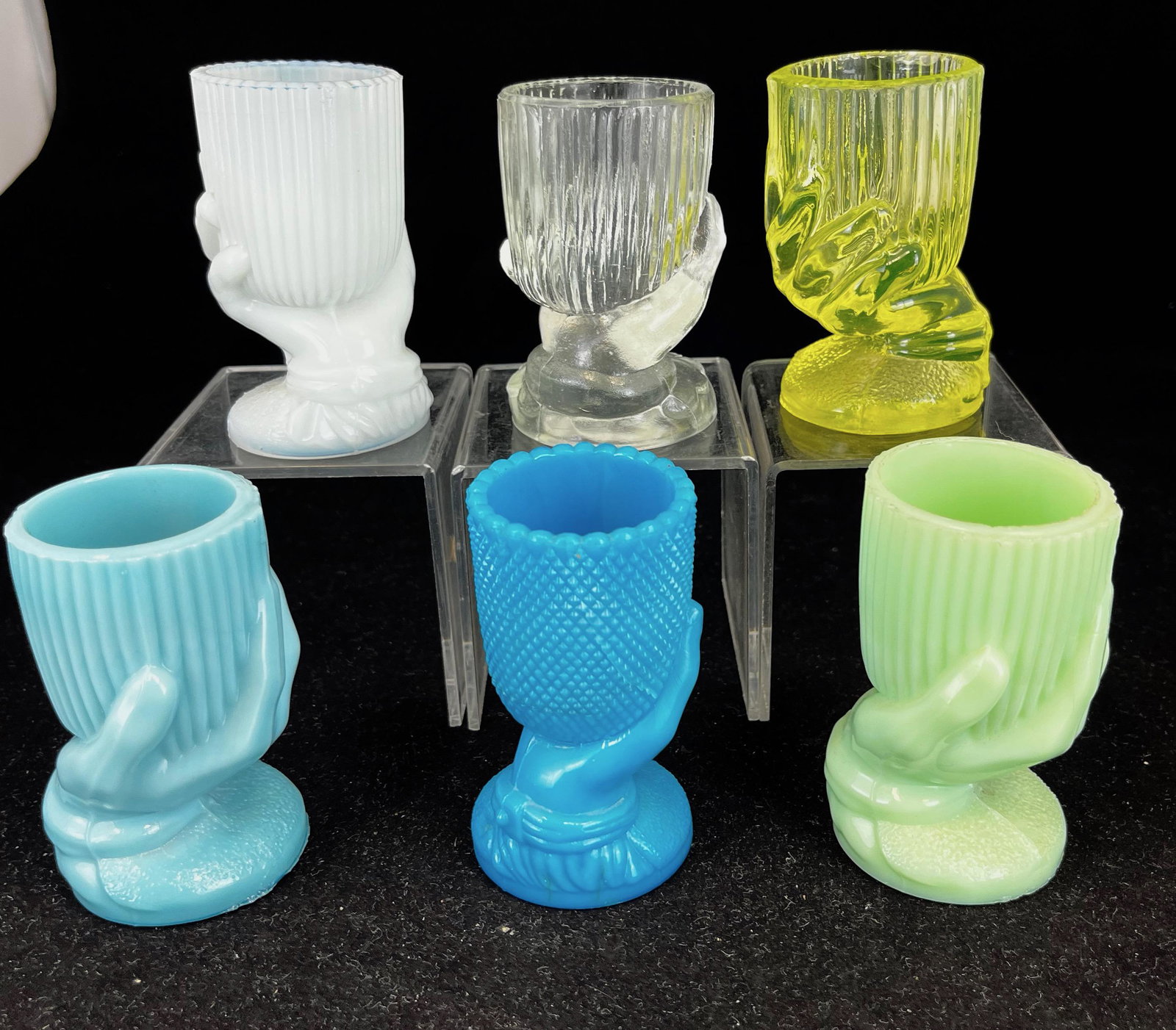 Six Beggar's Hand toothpick holders: Six Beggar's Hand toothpick holders in dark blue, opal, clear, canary, blue, and green, blue marked Portieux France; 3.5" ht. CONDITION: good with minor wear