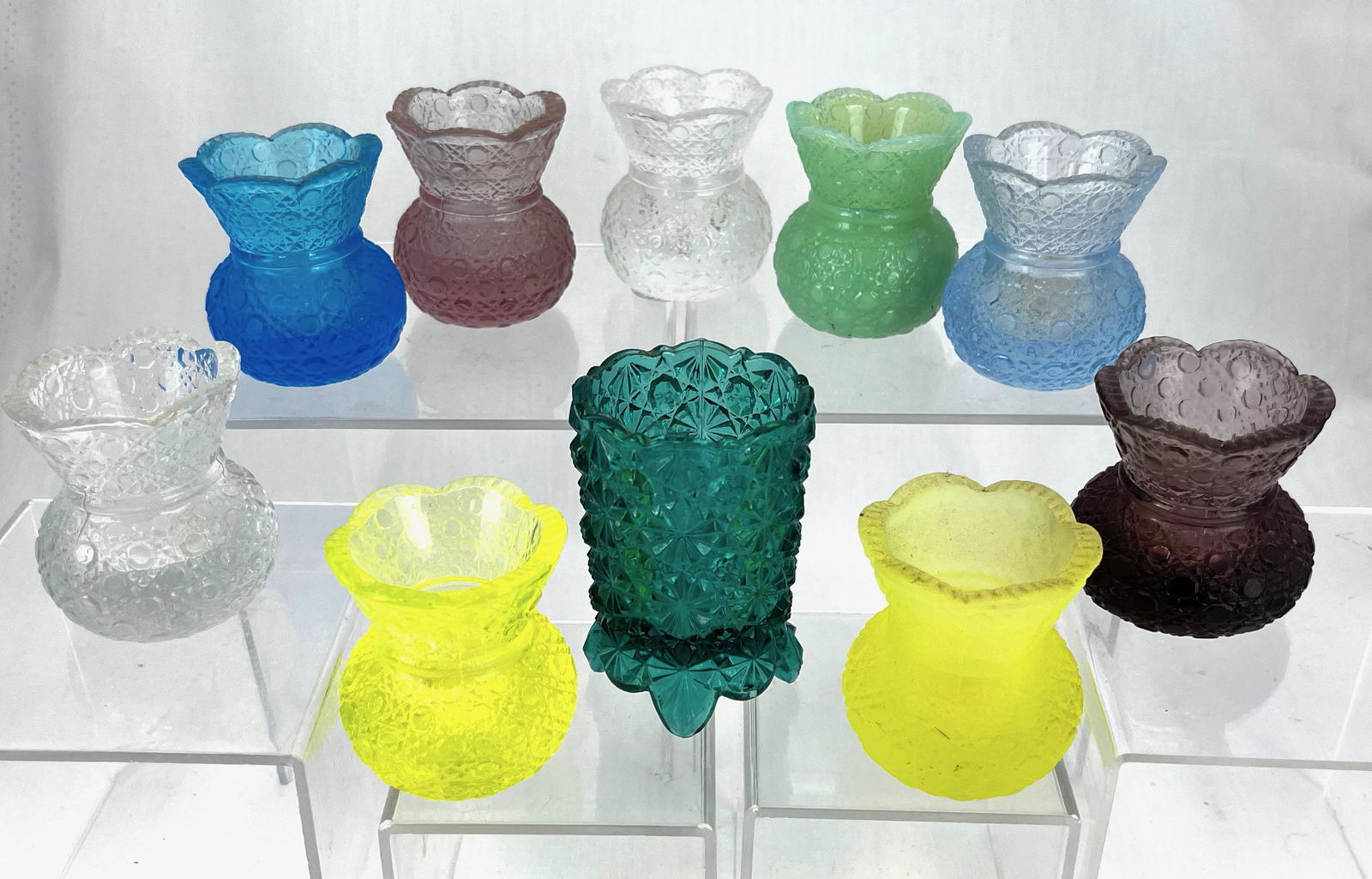 Group of 10 Daisy & Button toothpicks: Group of 10 Daisy & Button toothpick holders including 9 Mosser; tallest 3 1/4"; CONDITION: good with minor wear.