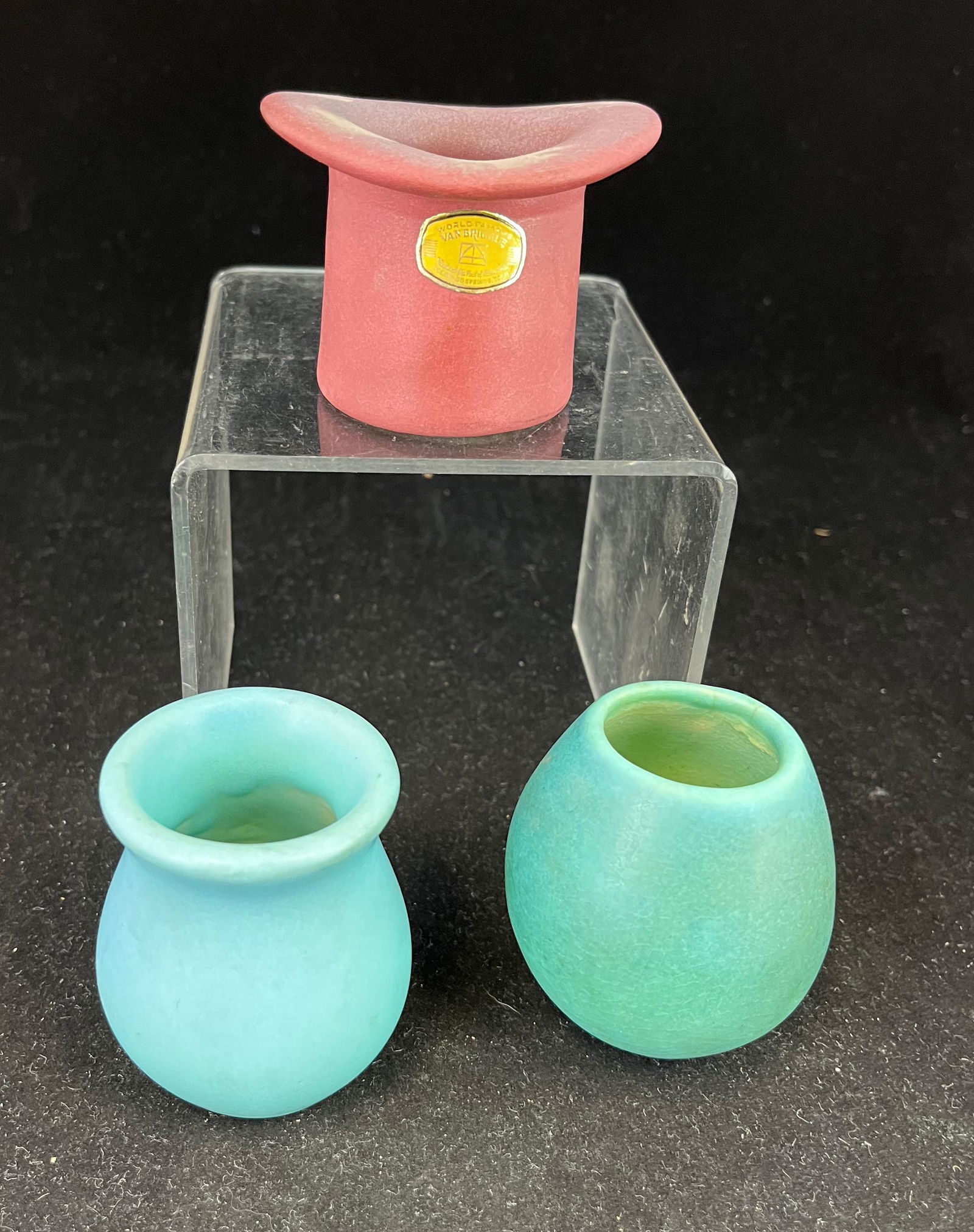 Three Van Briggle pottery toothpicks: Three Van Briggle toothpick holders including one blue, one blue/green, and one rose tallest 2.5". CONDITION: no defects found.
