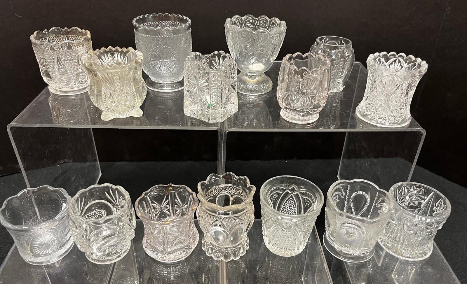 15 EAPG toothpick holders: 15 EAPG toothpick holders various makers and patterns including a Stippled with Circles, Garland of Roses, Love Star, Scroll & Cane Band, Paneled Thistle, Massachusetts, Jewel with Moon & Star, Duches