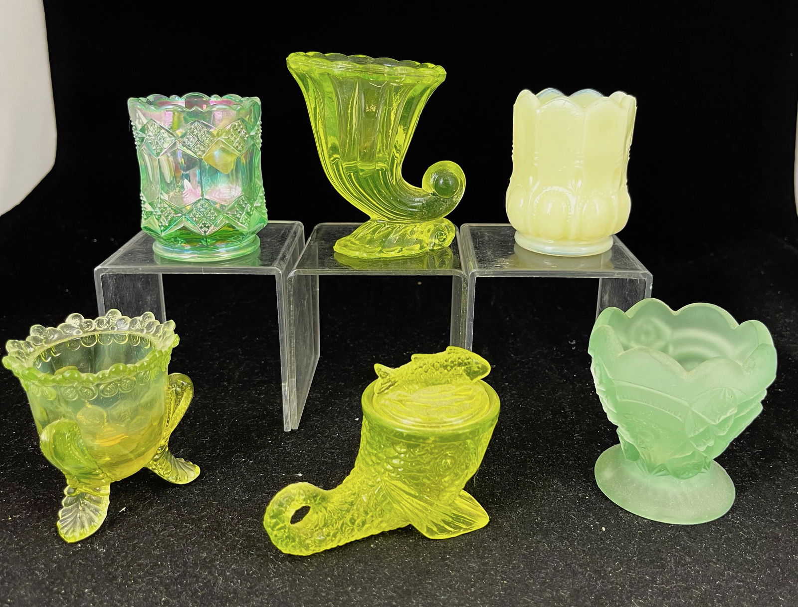 Group of six Vaseline toothpicks: Group of six Vaseline toothpick holders, various makers and patterns; tallest 3 1/4". CONDITION: good with minor wear.