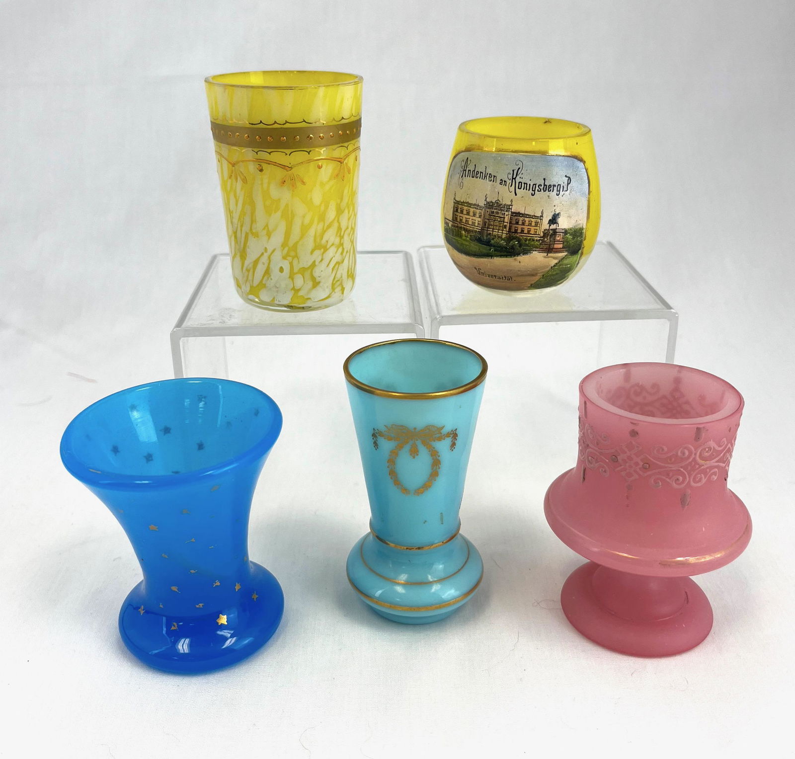 Five French toothpick holders: Five French colorful toothpick holders all with gold decoration, two are souvenirs; tallest 2.5". CONDITION: good with no defects noted.