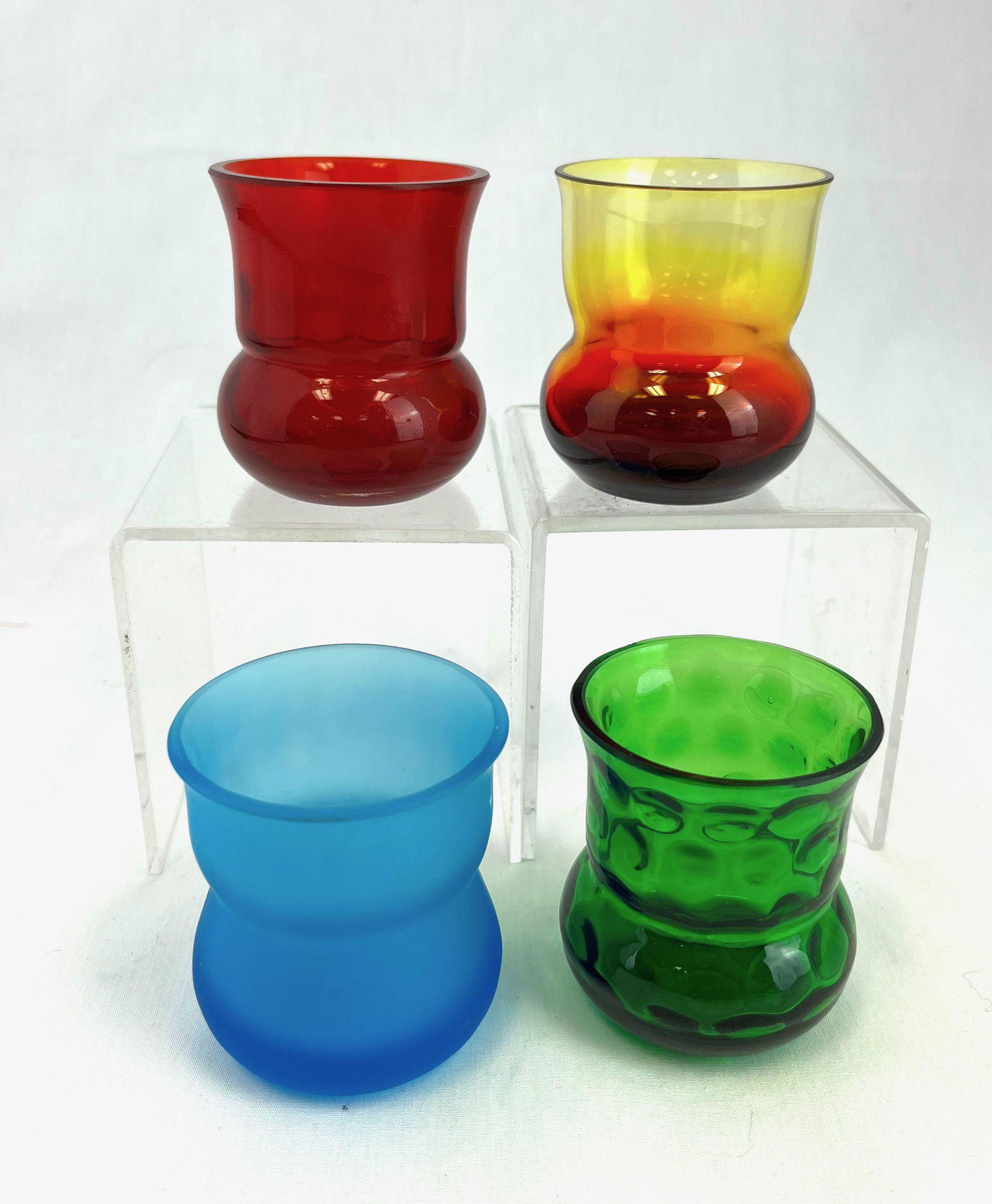 Four colorful Murano toothpicks: Four colorful Murano toothpick holders various patterns; tallest 2 1/4". CONDITION: good with no defects noted.