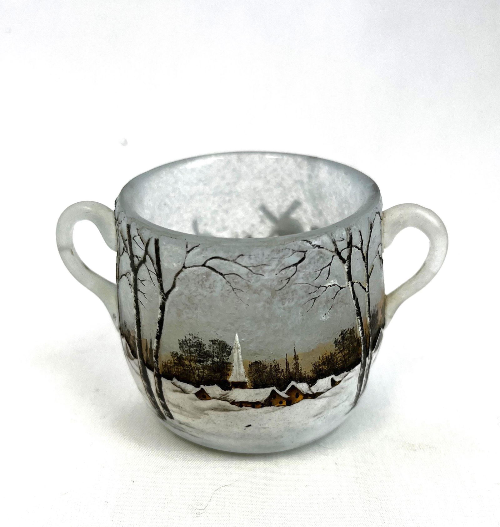 Daum Nancy winter scene toothpick: Daum Nancy Dutch winter scene two handled toothpick, signed Daum Nancy on bottom; 2" ht. CONDITION: cracked, see picture.