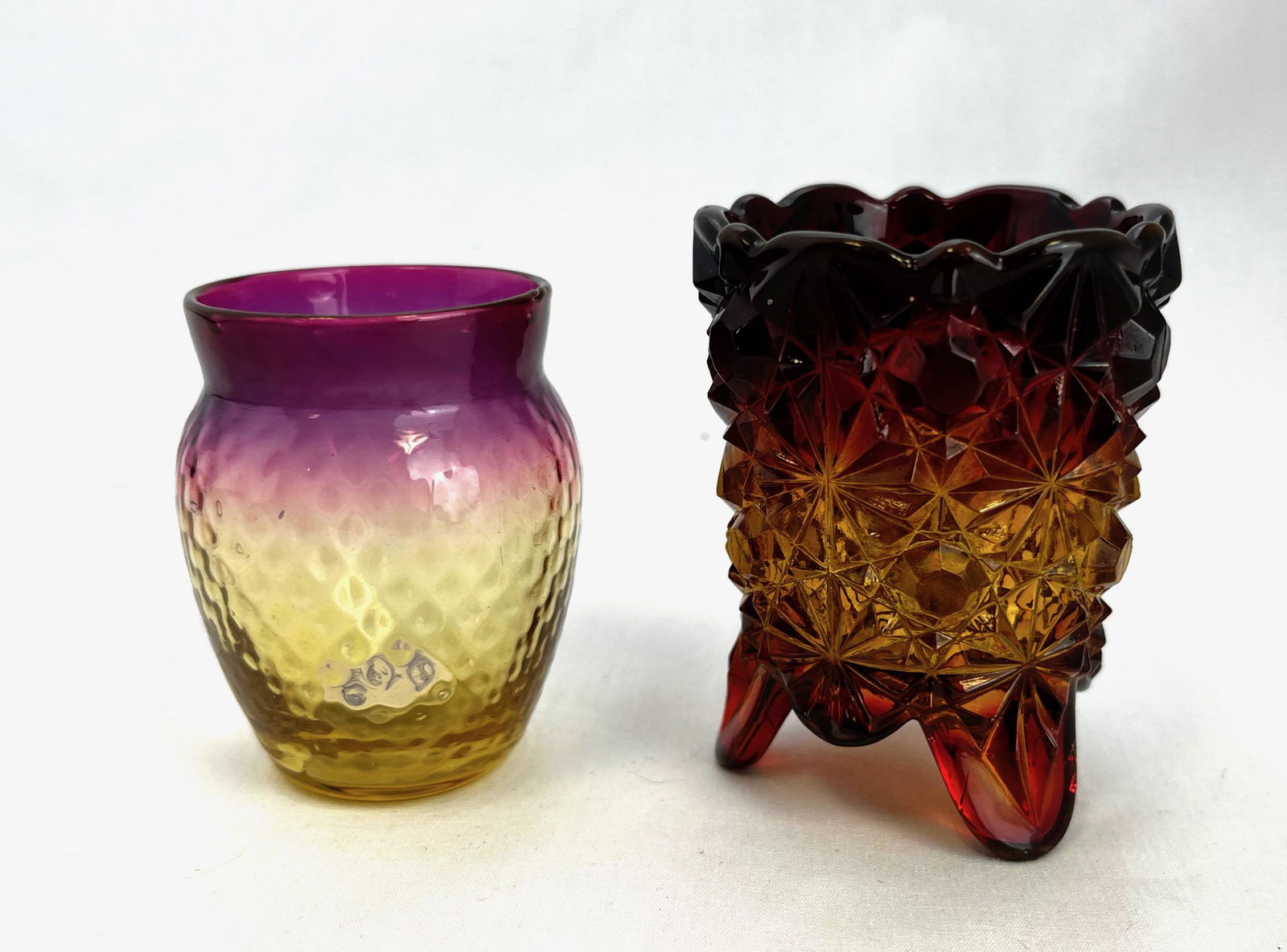 Two Amberina toothpick holders: Two Amberina toothpick holders, one Hobbs pressed, one Optic Diamond; tallest 2 3/4". CONDITION: good with no defects found.
