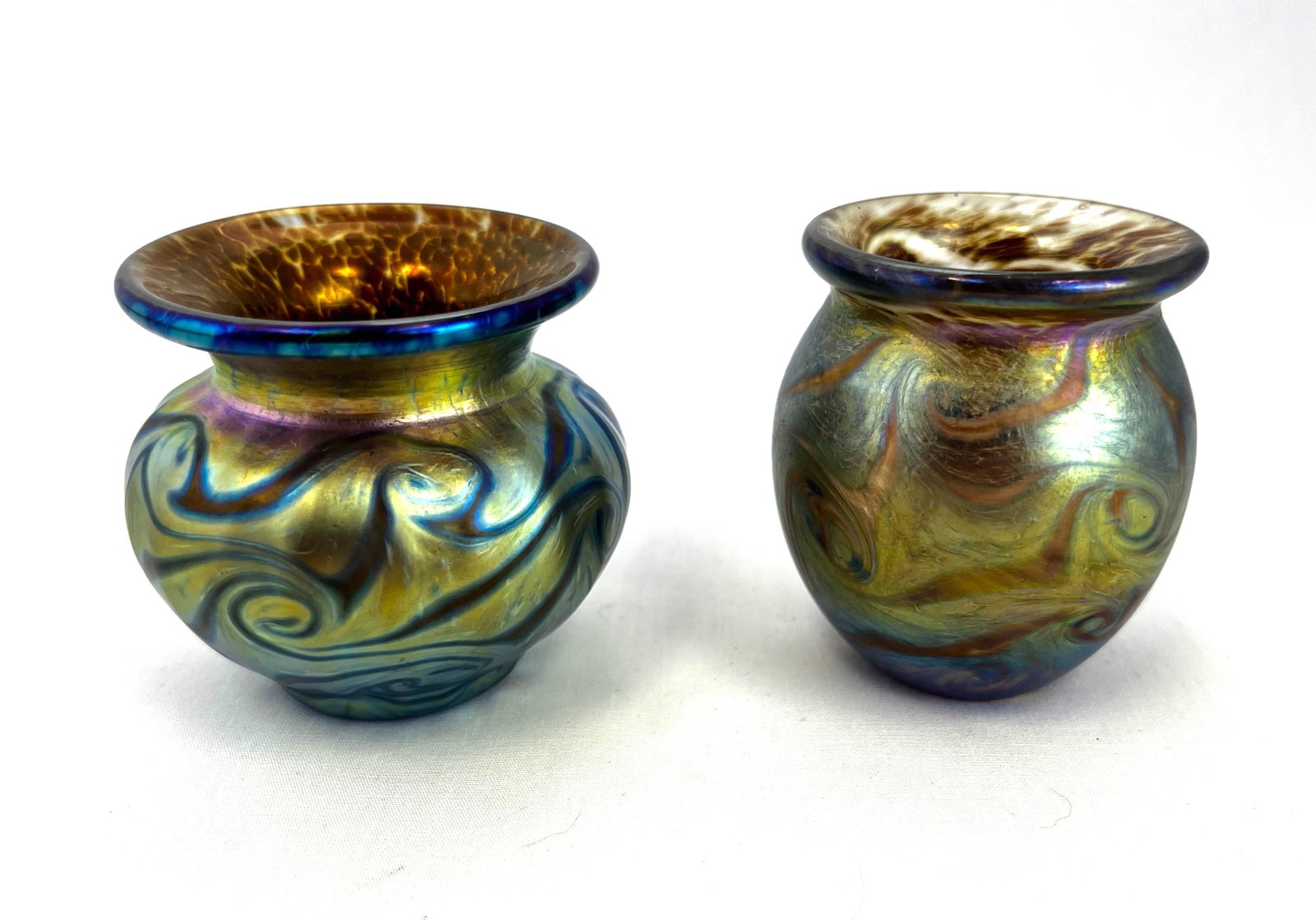 Two Terry Crider toothpick holders: Two signed Terry Crider gold in King Tut design toothpick holders; tallest 2". CONDITION no defects noted.