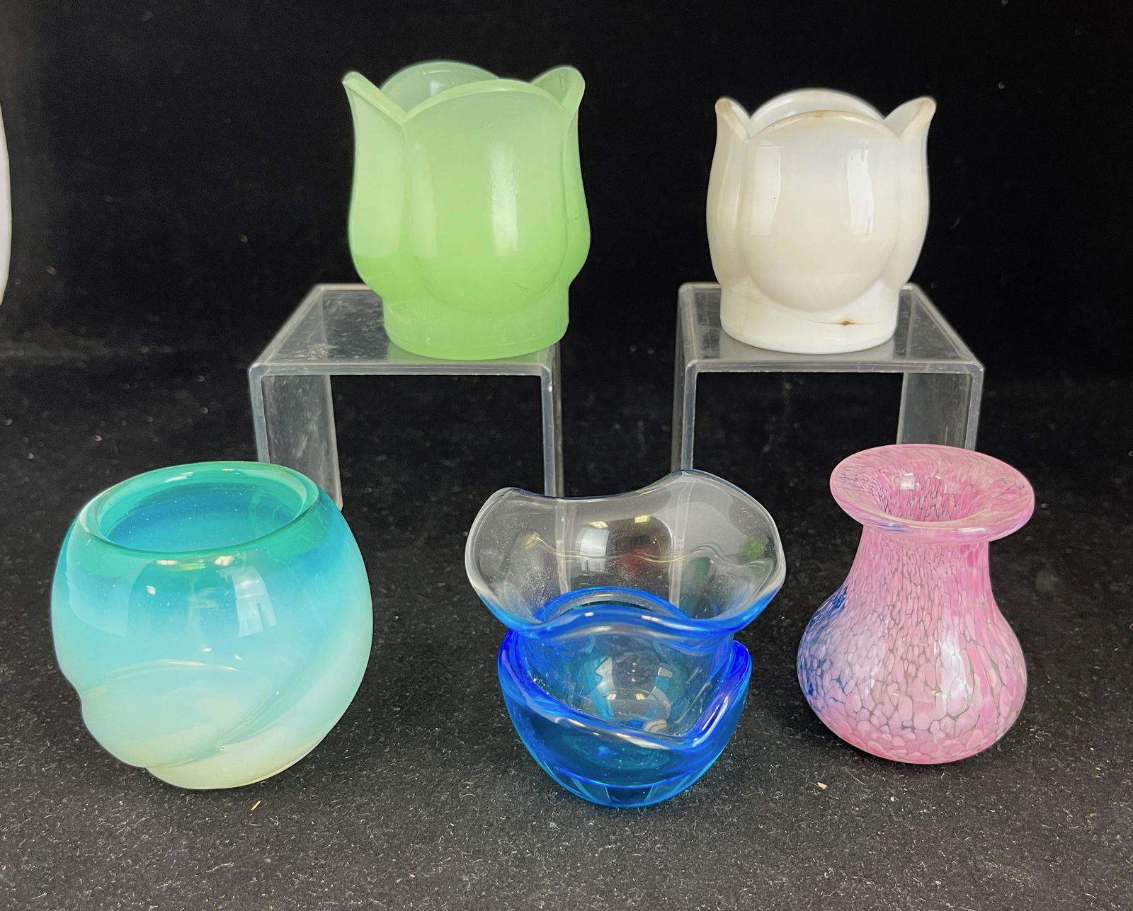 Five contemporary toothpick holders: Five contemporary toothpick holders, various makers including a signed Kosta Boda, patterns, and colors; tallest 2 3/4". CONDITION: good.